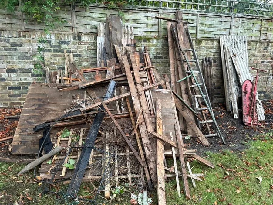 Timber and an old ladder ready for collection