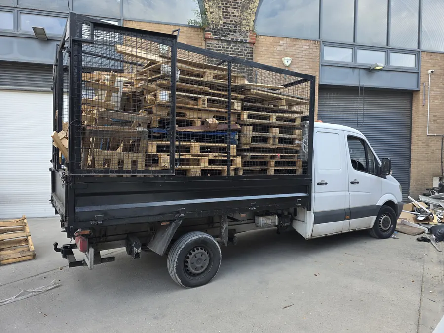 Pallets stacked high in the cage