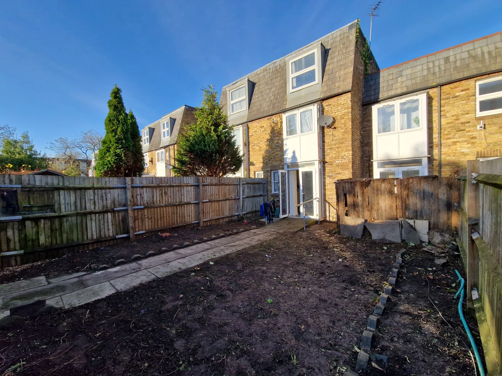 After: back garden cleared to soil